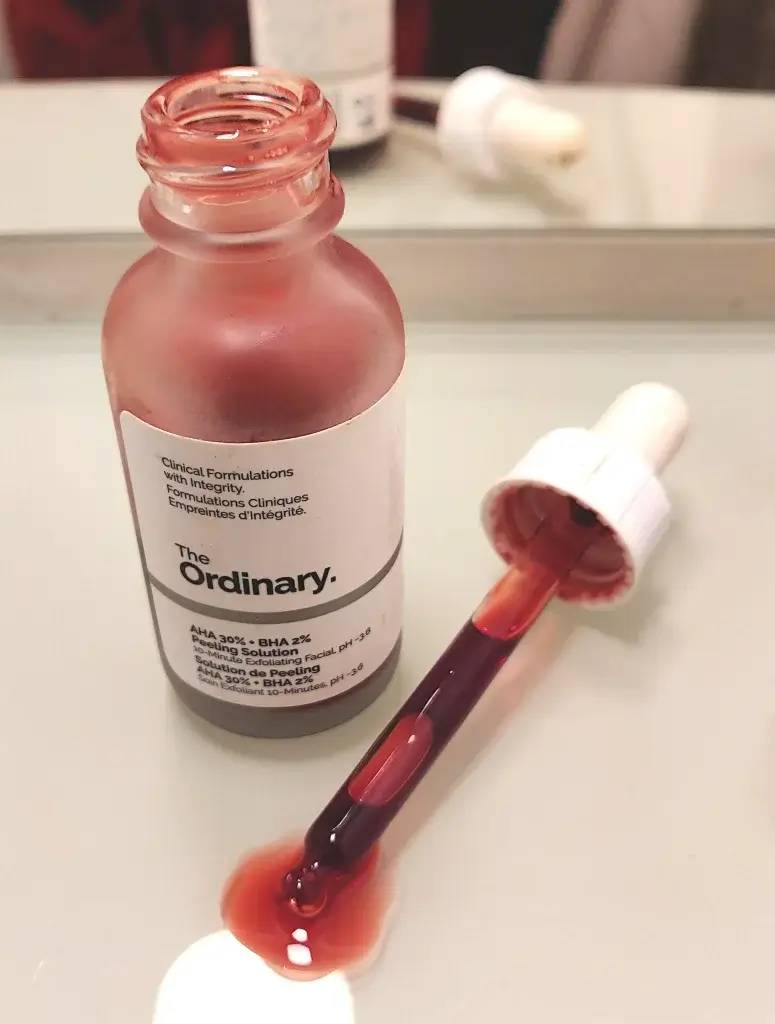 The Ordinary's AHA and BHA Peeling Solution, which may help to stop pimples.