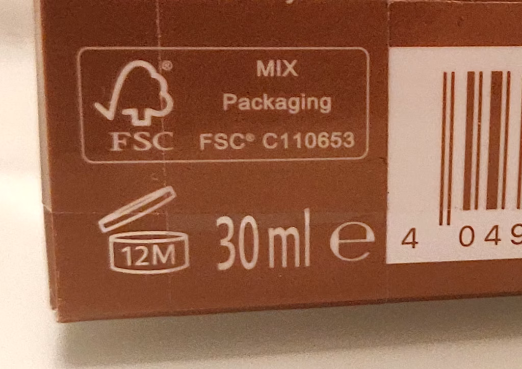 A PAO (Period-After-Opening) symbol on packaging, which indicates how long personal care products remains safe and effective after opening.