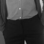 A man with his hands in his pant pockets.