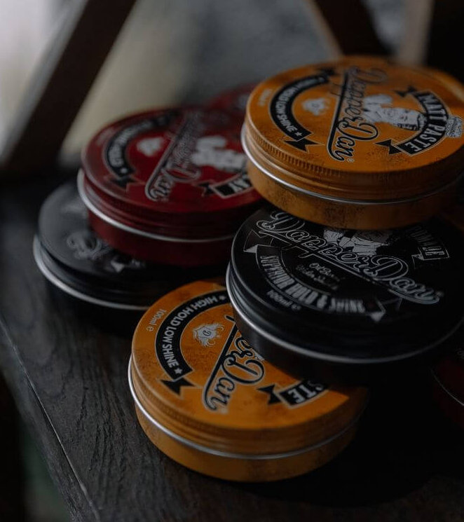 Dapper Dan pomade with packaging modeled directly after vintage mid-century products.